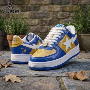 Blue and gold patent leather sneakers with white star logo, SGR tongue branding, and gold poodle heel embroidery.!