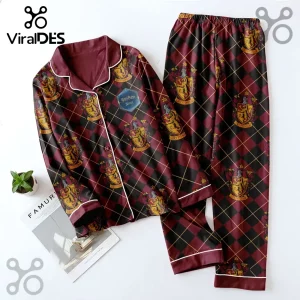 Gryffindor pajama set with burgundy and black diamond pattern, featuring repeating gold lion crests and white piping.!