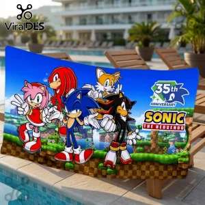 Sonic the Hedgehog 35th Anniversary beach towel featuring Sonic, Amy, Knuckles, Tails, and Shadow on a game-world background.!