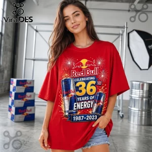 Red Bull 36 Years Anniversary Red T-Shirt featuring graphics of two cans, fireworks, and the text 1987-2023 on cotton.
