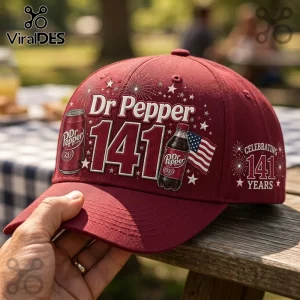 Dr Pepper 141st Anniversary burgundy baseball cap with graphic print, American flag, and beverage bottle imagery.