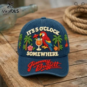 Jimmy Buffett It Is 5 OClock Somewhere baseball cap in blue denim with tropical parrot, cocktail, and palm tree embroidery.