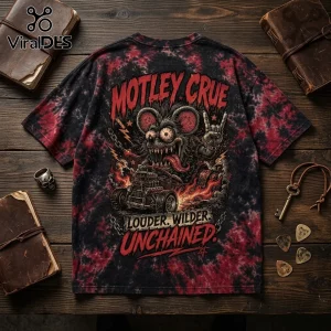 Motley Crue graphic t-shirt with red and black tie-dye print featuring a monster driving a hot rod on wooden background.!