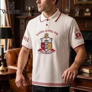 Kappa Alpha Psi polo shirt in white with crimson embroidery, featuring the fraternity crest, 1911, and Greek columns.!