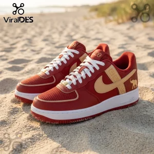 Crimson and tan low-top sneakers featuring Delta Sigma Theta Greek letters, gold elephant embroidery, and white laces.!