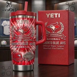 Red tie-dye Yeti tumbler featuring Toronto Blue Jays 50th anniversary branding, a baseball cap, and stadium graphic.!
