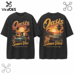Black vintage-wash cotton t-shirt featuring sunset beach scenery, classic cars, and text Oasis Summer Vibes.!