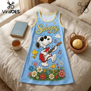 Light blue Snoopy tank top dress with yellow trim featuring Snoopy playing a red electric guitar in a flower field.!