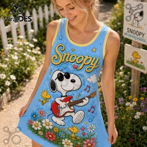 Light blue tank dress featuring Snoopy wearing sunglasses and playing a red electric guitar with Woodstock in a garden.!