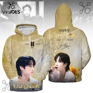 BTS Jungkook Gold Portrait Pullover Hoodie featuring musical notes, a gold portrait, and decorative signature graphics.
