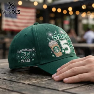 Starbucks 55th Anniversary Dark Green Baseball Cap featuring a coffee frappuccino graphic and firework illustrations.
