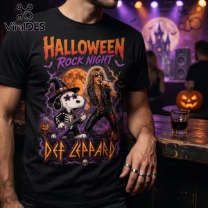 Snoopy x Def Leppard Midnight Howl Halloween T-Shirt on a man, featuring Snoopy in a witch hat playing a purple guitar.