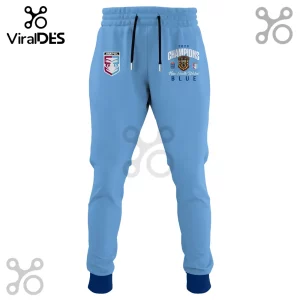 Light blue jogger pants featuring New South Wales Blues 2026 Champions graphics and Ampol logo on a white background.!