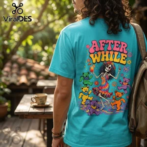 Turquoise t-shirt featuring a psychedelic skeleton dancing with colorful bears and the text After While on the back.!