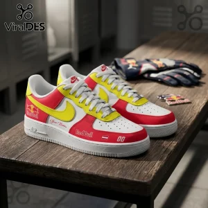 Custom Red Bull Racing Nike Air Force 1 sneakers with yellow, red, and white leather panels on a wooden bench.