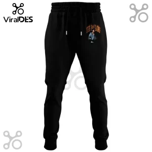 J. Cole The Fall Off 2026 World Tour black joggers featuring a graphic of the artist and orange stylized text.