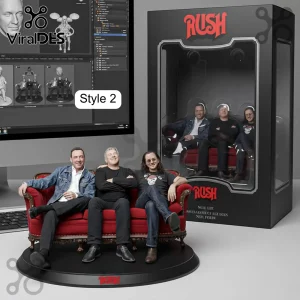 Rush band member figurines seated on a red velvet miniature sofa with a black display box and logo branding.!