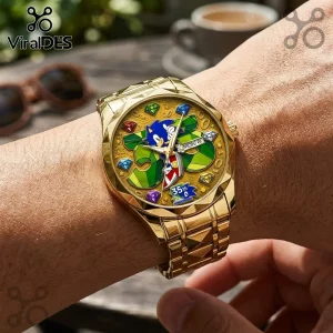 Gold-toned metal wristwatch featuring a Sonic the Hedgehog 35th anniversary dial with colorful gem hour markers.!