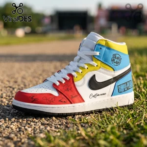 Simple Plan Bigger Than You Think Tour high-top sneakers with white, red, yellow, and blue leather panels on grass.