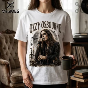 White crewneck t-shirt featuring a vintage-style graphic of Ozzy Osbourne, a full moon, bats, candles, and a human skull.!