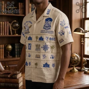 Beige button-up shirt featuring blue embroidered Phi Beta Sigma fraternity iconography including doves, palms, and crests.!