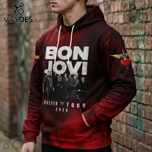Man wearing red and black tie-dye Bon Jovi Forever Tour 2026 hoodie with band members and heart-dagger graphic print.!