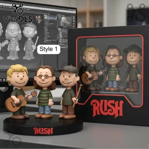 Rush band Peanuts-style vinyl figurines featuring Alex Lifeson, Geddy Lee, and Neil Peart on a black branded display base.!