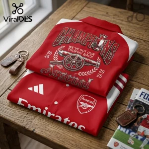 Arsenal FC Premier League Champions 2025-26 button-down shirt featuring red fabric, white accents, and commemorative text.