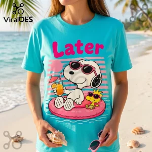 Turquoise crew neck t-shirt featuring Snoopy and Woodstock on a pink inner tube with the word Later in pink text.!
