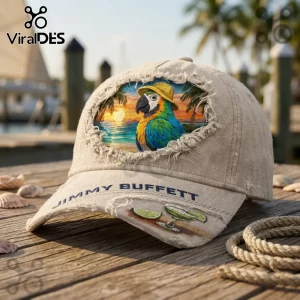 Jimmy Buffett Parrot Embroidered Distressed Baseball Cap in beige with a tropical sunset macaw patch and margarita art.