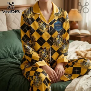 Hufflepuff yellow and black pajama set with repeating house crests, white piping, and a Harry Potter chest patch.!