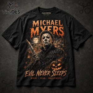 Black cotton t-shirt featuring Michael Myers holding a knife, jack-o'-lantern, orange horror text, and full moon graphic.!
