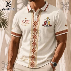 Kappa Alpha Psi cream polo shirt with crimson and gold geometric embroidery, Greek lettering, and crest on chest.!
