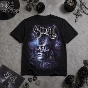 Black t-shirt featuring a Ghost band logo and a metallic skull in a purple liquid landscape on a grey textured background.!