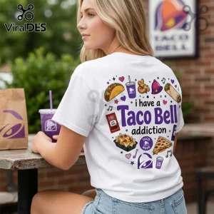 Woman wearing a white t-shirt featuring Taco Bell food illustrations and the text i have a Taco Bell addiction.!