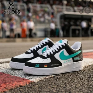Mercedes AMG Petronas F1 Custom Nike Air Force 1 sneakers with black, white, and teal accents on a racetrack background.