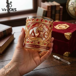 Delta Sigma Theta glass tumbler with gold filigree, red jewels, torch emblem, and Intelligence is the Torch of Wisdom text.!