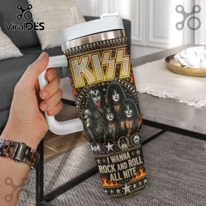 KISS band stainless steel tumbler with white handle, straw, and graphics featuring members in makeup and concert flames.!