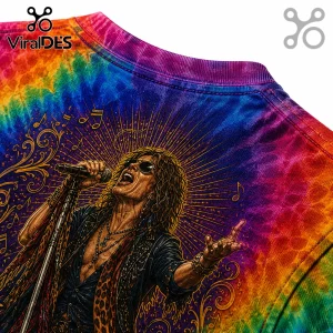 Rock singer with curly hair and sunglasses performing on a vibrant rainbow tie-dye t-shirt with gold music note accents.!