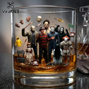 Horror movie character whiskey glass featuring Freddy, Jason, Michael Myers, Pennywise, and Annabelle in amber liquid.!