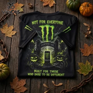 Monster Energy Halloween Unleash The Beast T-Shirt with neon green logo, graveyard graphic, and pumpkins on black fabric.