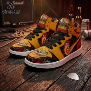 Guns N' Roses high-top sneakers with yellow, red, and black floral patterns on a wooden stage with beer bottles.!