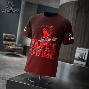 J-Hope Hope On The Stage Tour maroon t-shirt with red graphic text and a centered silhouette on a display stand.