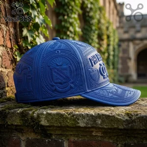Royal blue baseball cap with 3D embossed Phi Beta Sigma fraternity crest, symbols, and text on a stone wall background.!