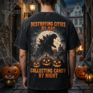 Godzilla Halloween 2026 Horror Theme T-Shirt featuring a black shirt with Godzilla, full moon, and pumpkins printed on back.