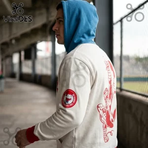 Diablos Rojos x Spider-Man Marvel Beige Hoodie featuring a blue hood, red graphic on the back, and team sleeve patch.