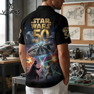 Black short-sleeve button-up shirt featuring a Star Wars 50th anniversary print with Darth Vader, Luke Skywalker, and ships.!
