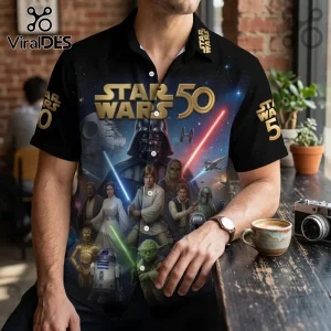 Black short-sleeve button-down shirt featuring Star Wars 50th anniversary graphics, Darth Vader, Luke, and Yoda characters.!