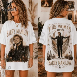 White oversized t-shirt featuring Barry Manilow portrait, gold celestial stars, crescent moon, and floral illustrations.!