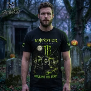 Monster Energy Halloween Unleash The Beast T-Shirt with grim reaper holding drink in a dark cemetery setting.